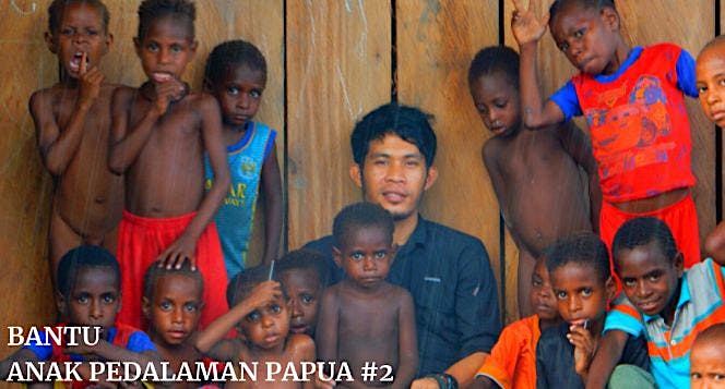 Bantu anak pedalaman Papua 2